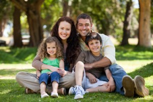 Family of 4 sitting down